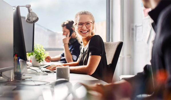 Image of woman smiling and text reading: Great humans needed, at the heart of every great change is a great human. Accenture is now hiring across Operations.